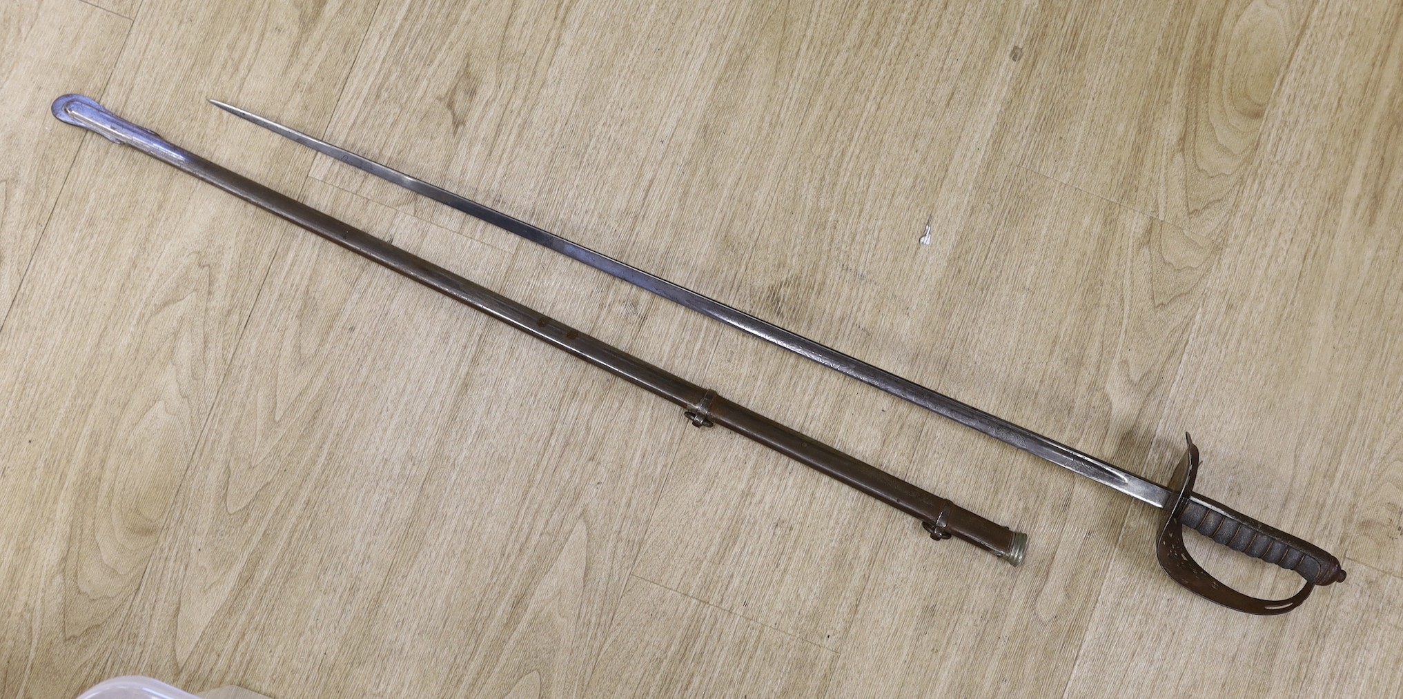 A George V officers sword with scabbard and a bayonet, sword100cm long